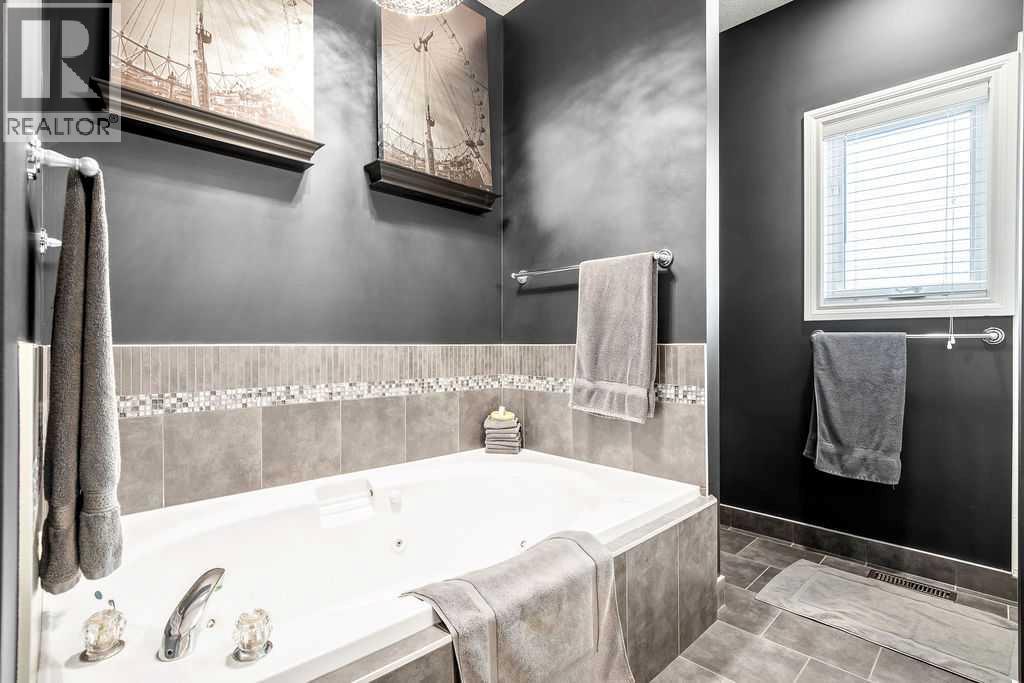 Single Family House Bungalow for Sale in  Evergreen Crescent SW Evergreen Calgary 