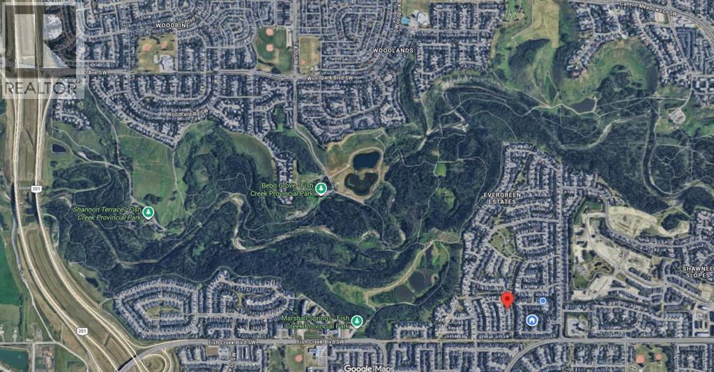 Single Family House Bungalow for Sale in  Evergreen Crescent SW Evergreen Calgary 