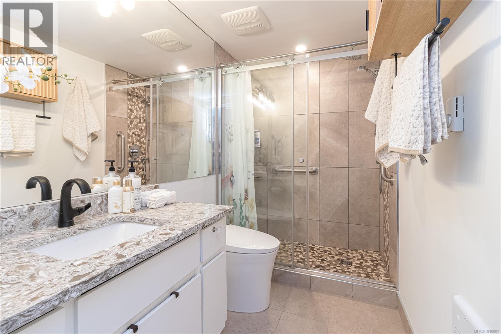 #101 2427 AMHERST AVE - 23