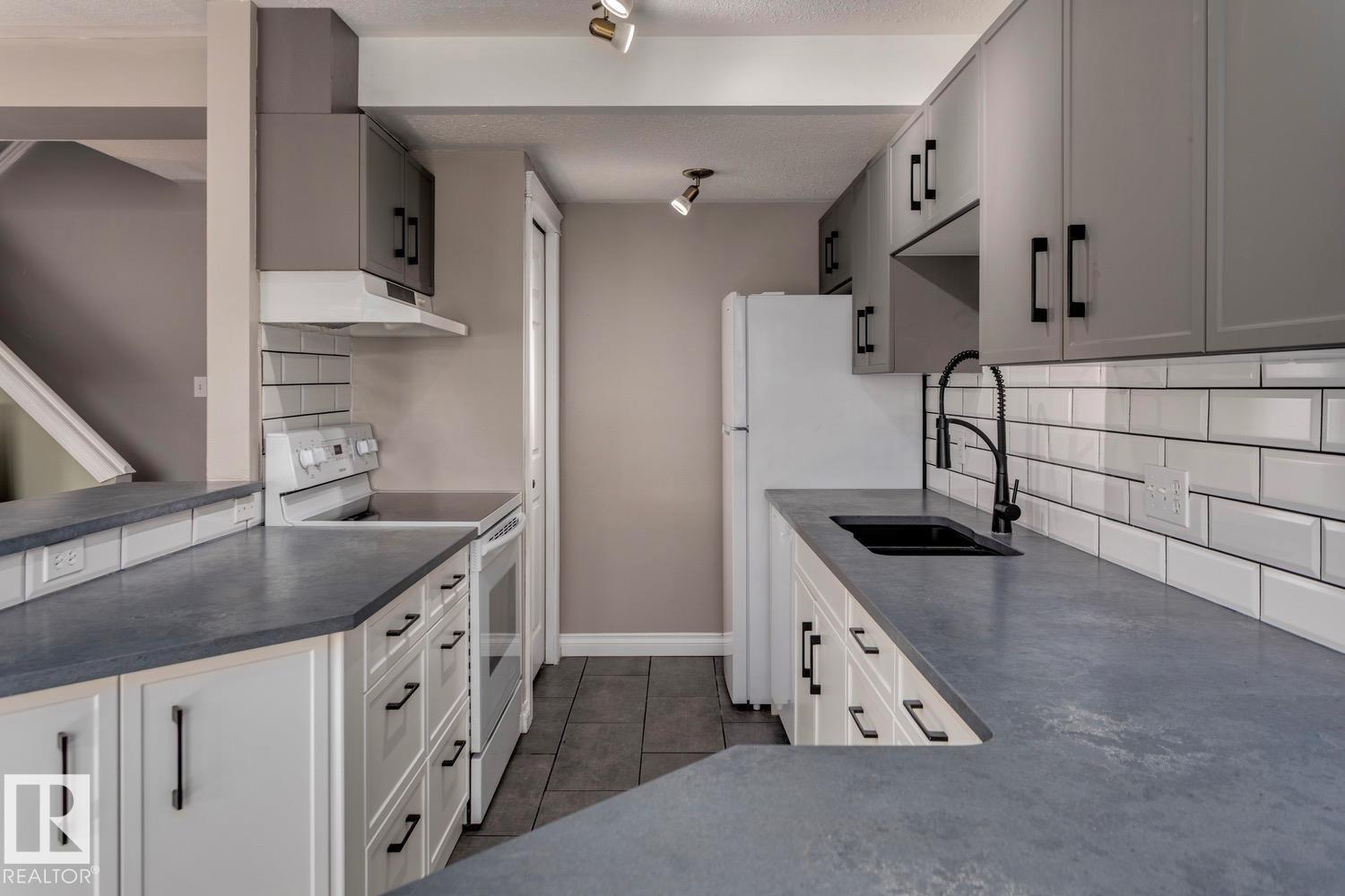 #209 11033 127 ST NW - 9