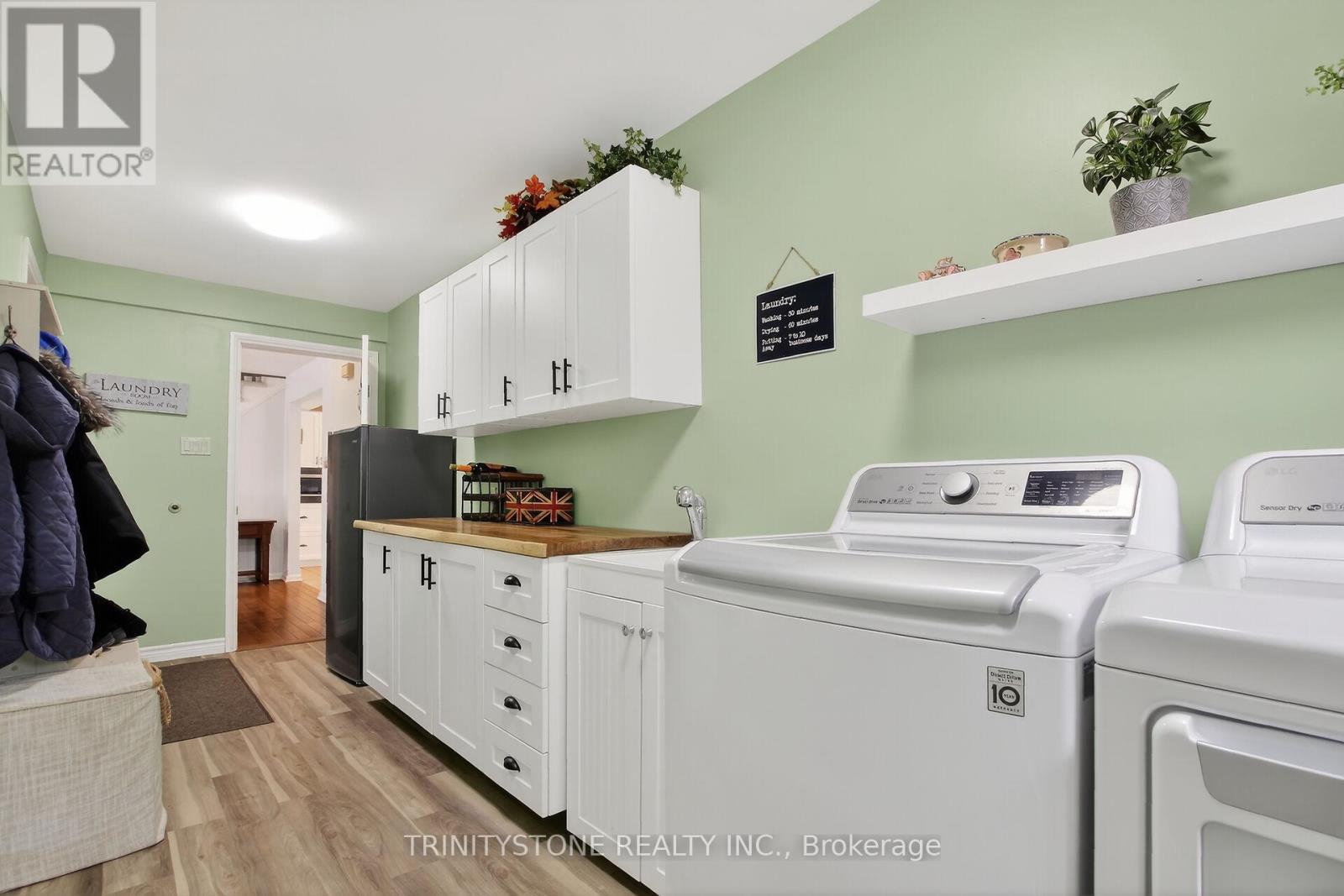 main floor laundry, mud room from garage