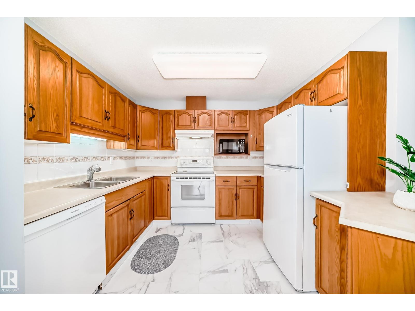 #302 13450 114 AV NW - 2