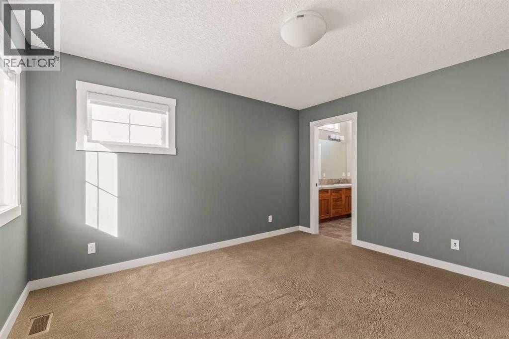 Single Family House for Sale in  Aspen Summit Green SW Aspen Woods Calgary 