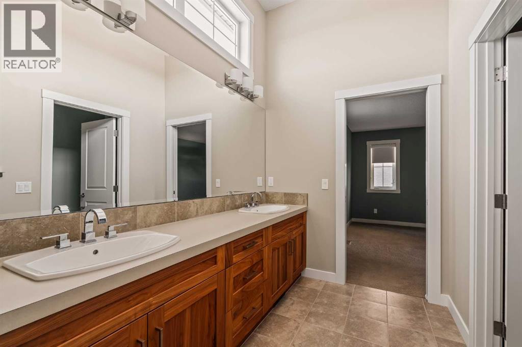 Single Family House for Sale in  Aspen Summit Green SW Aspen Woods Calgary 