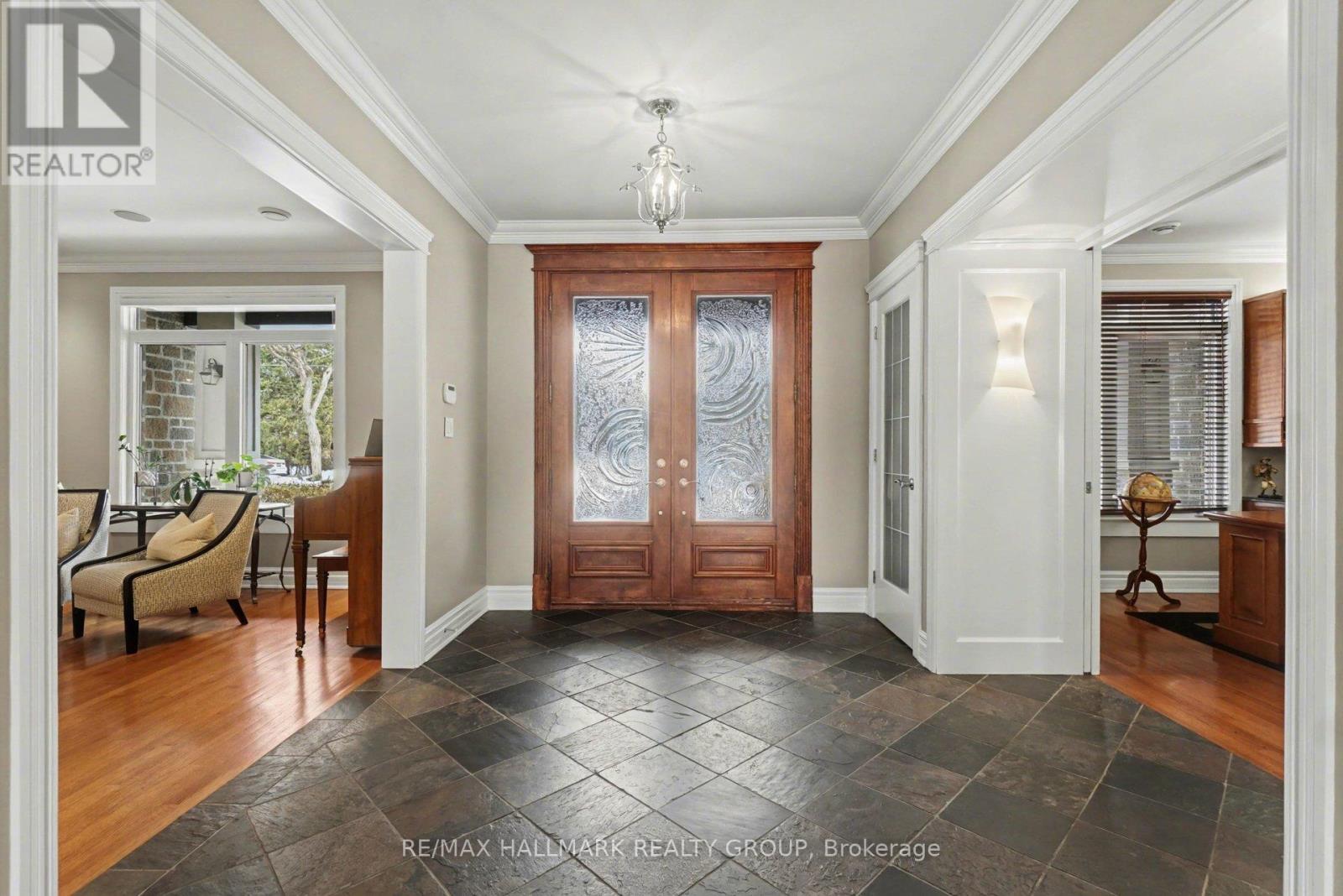 Foyer, radiant heated floor, den on the right.