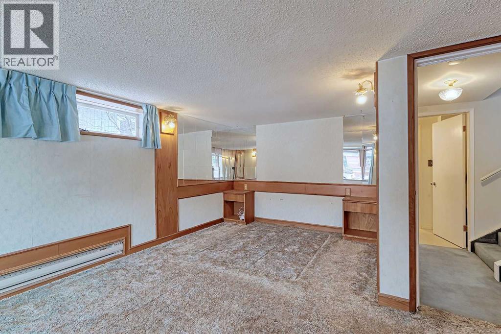 Single Family House 4 Level for Sale in  Wildwood Drive SW Wildwood Calgary 