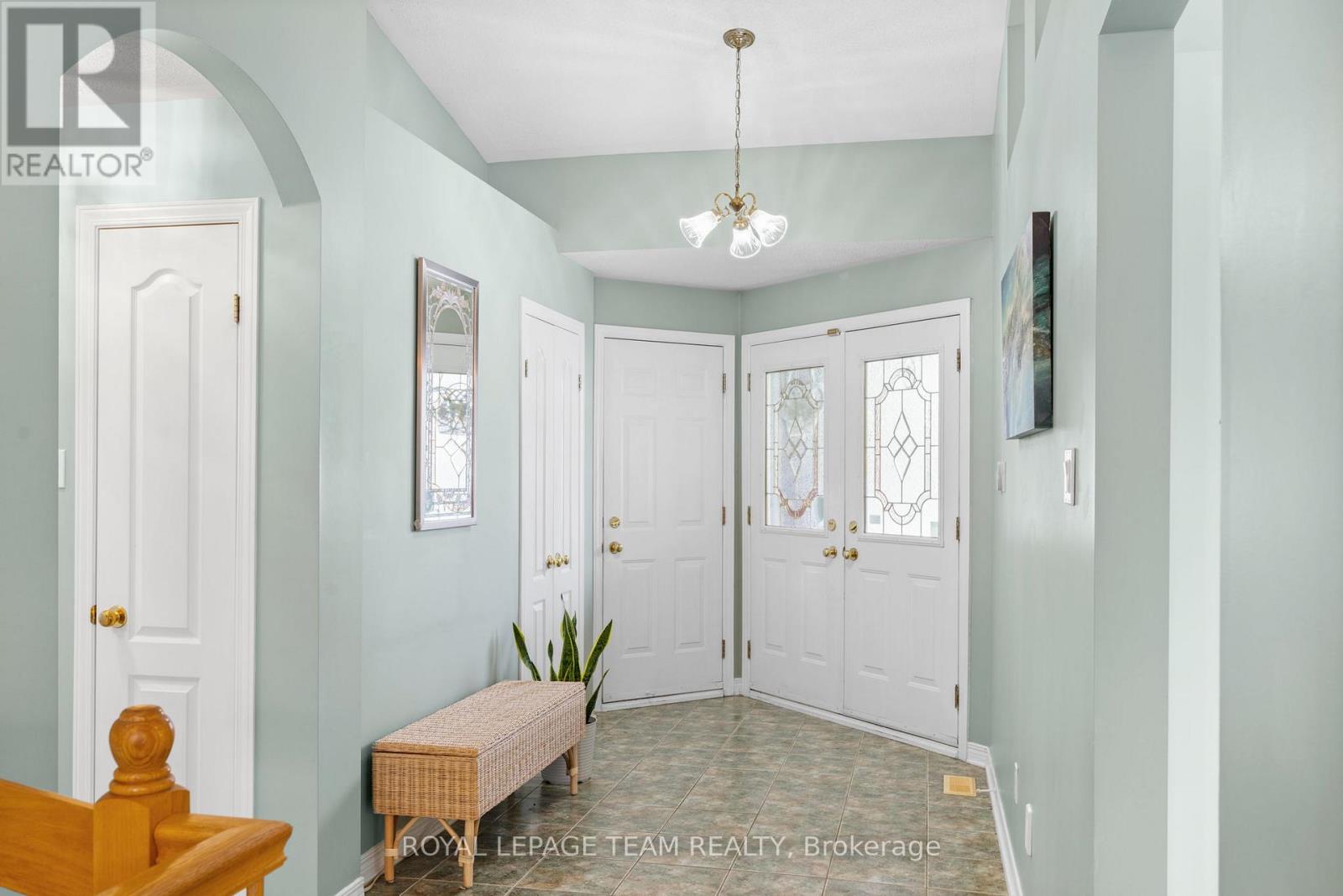 Foyer with large closet & access to garage