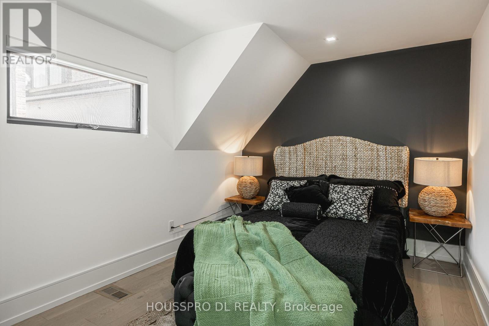 Primary Suite W/ Cathedral Ceiling & Glass Wall