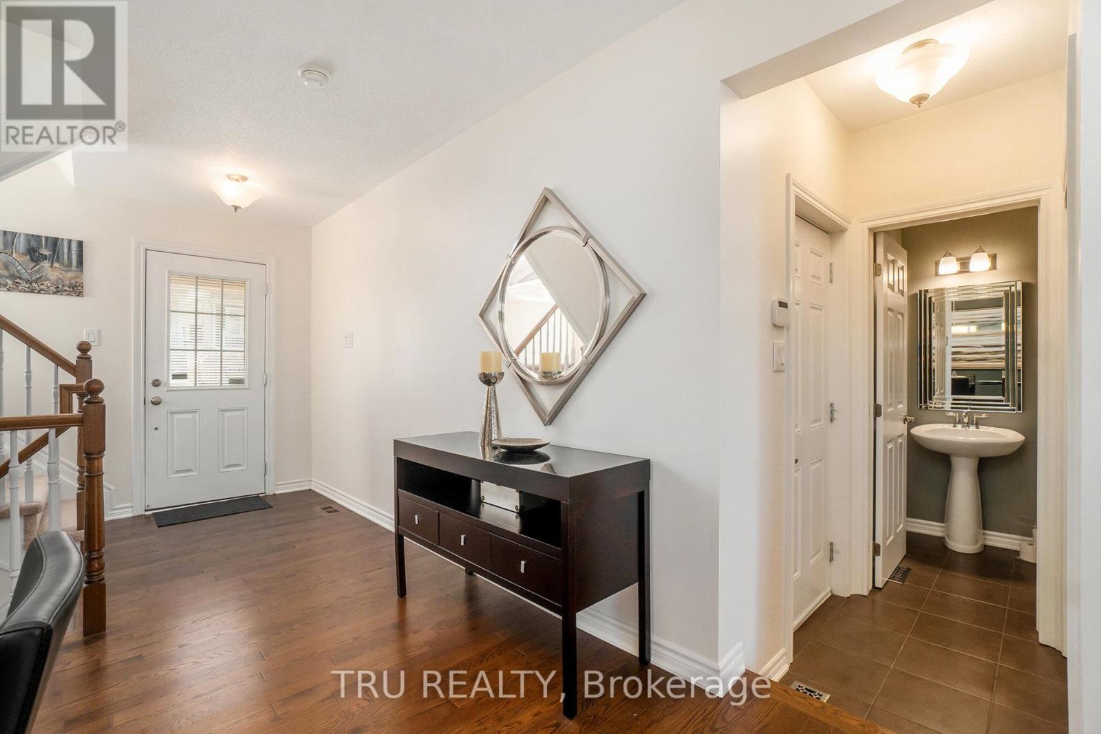 Open inviting entrance and powder room