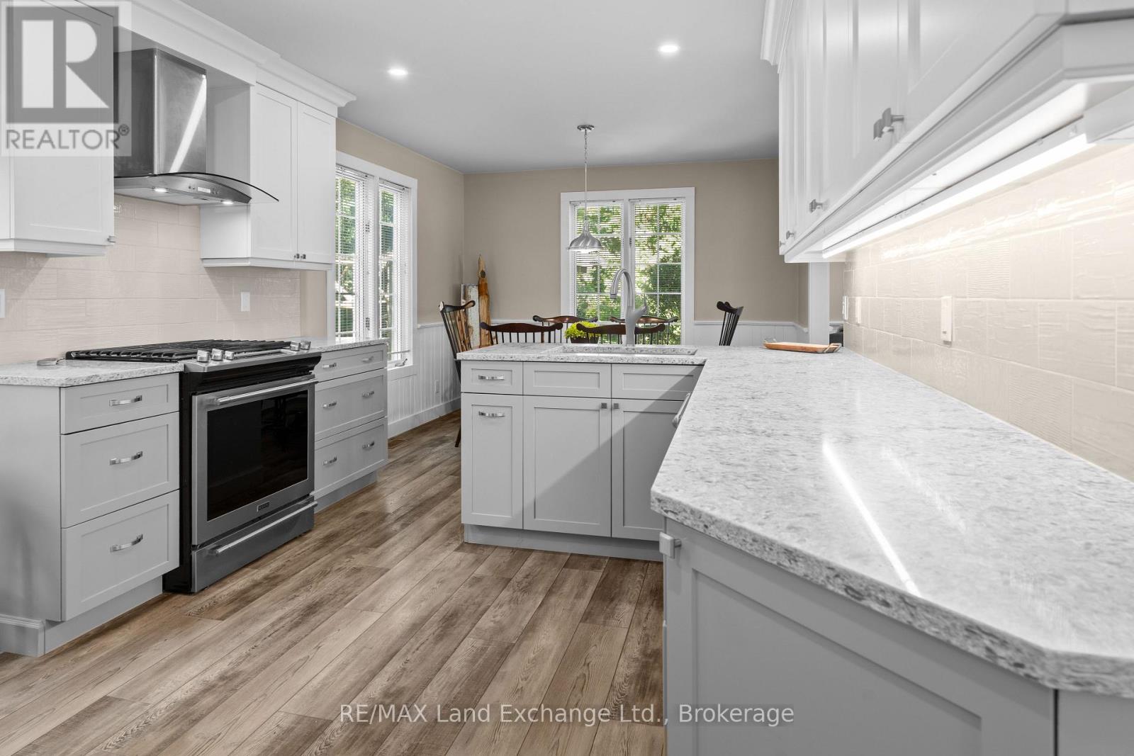 Updated Kitchen-white and grey cabinetry w/ quartz