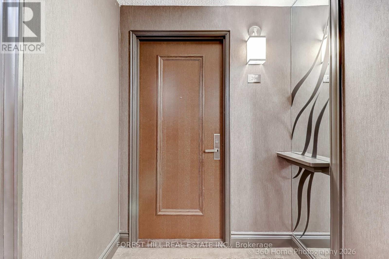 Front door of Suite 204