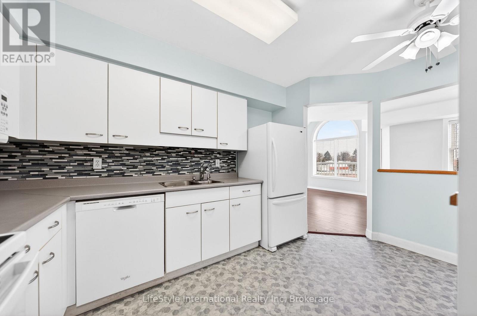 #306 208 SILVERCREEK PARKWAY N - 7