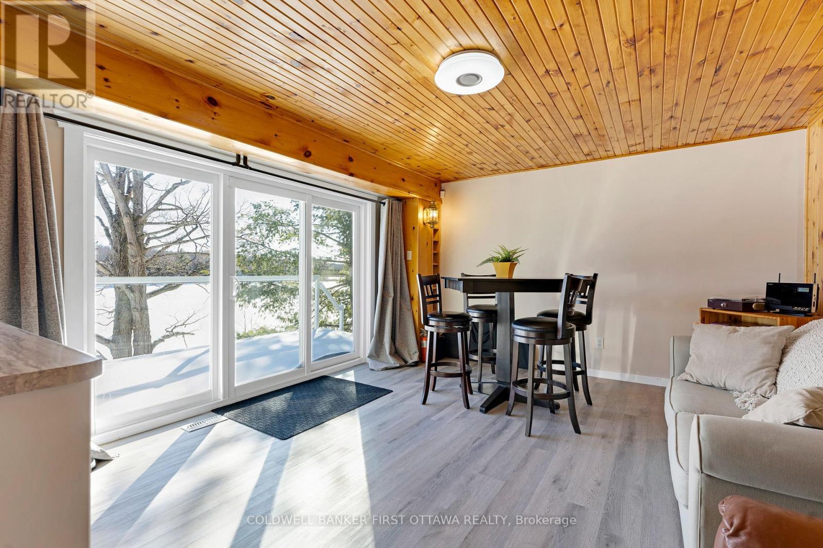 Lower level family room, or  bedroom, with deck