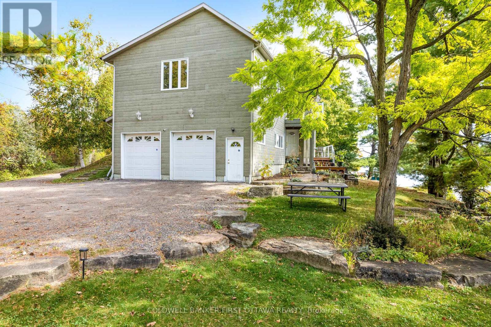 Oversized garage with workshop and inside entry
