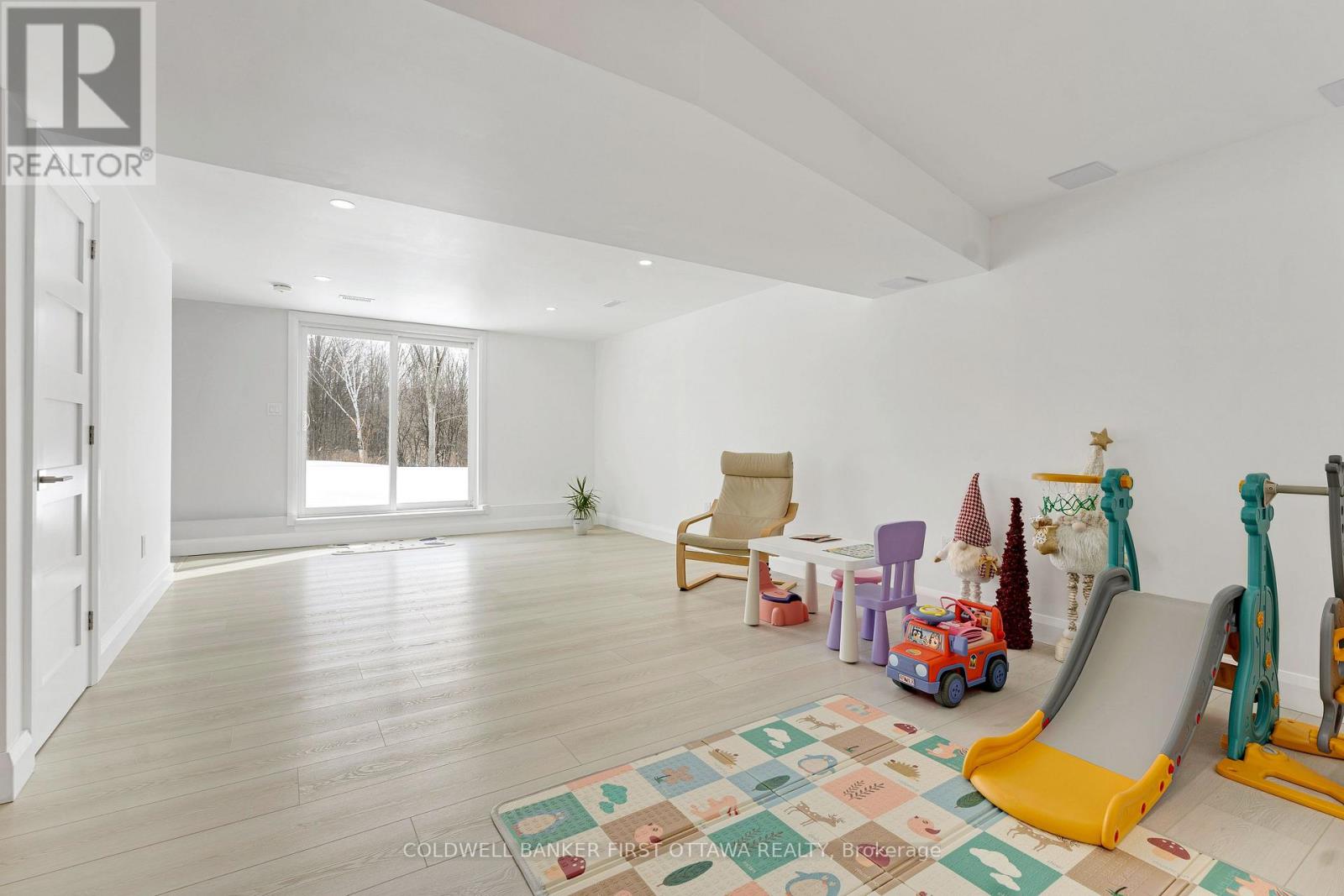 Lower level rec room; walkout to spacious yard