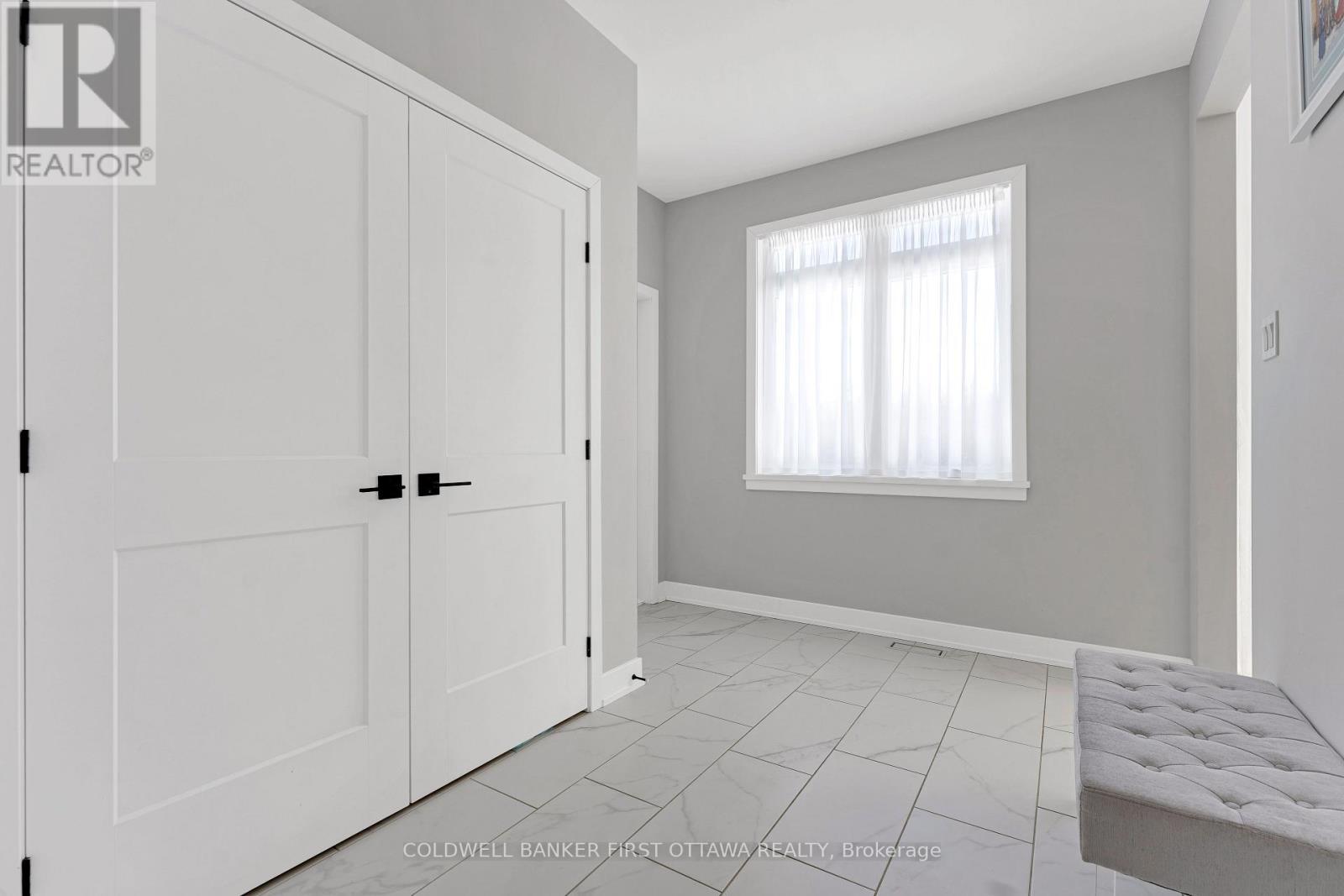 Back foyer/mudroom with access to garage