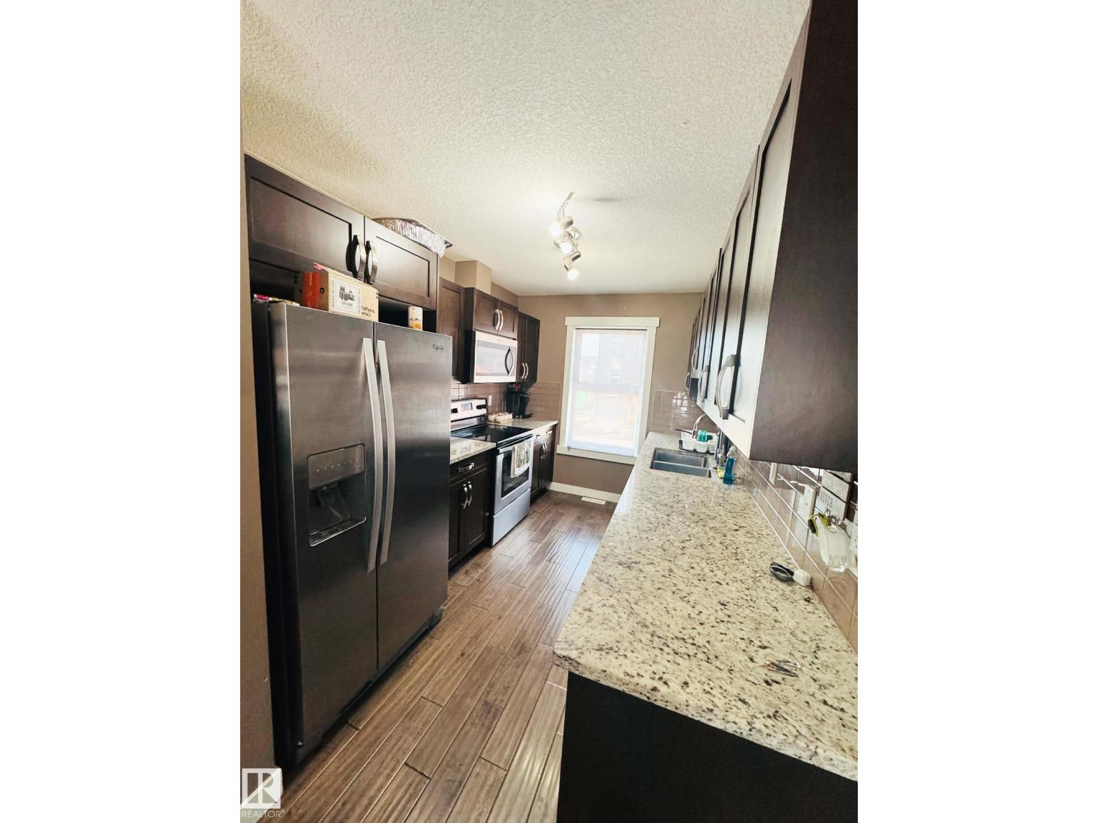 #311 401 SOUTHFORK DR, Leduc