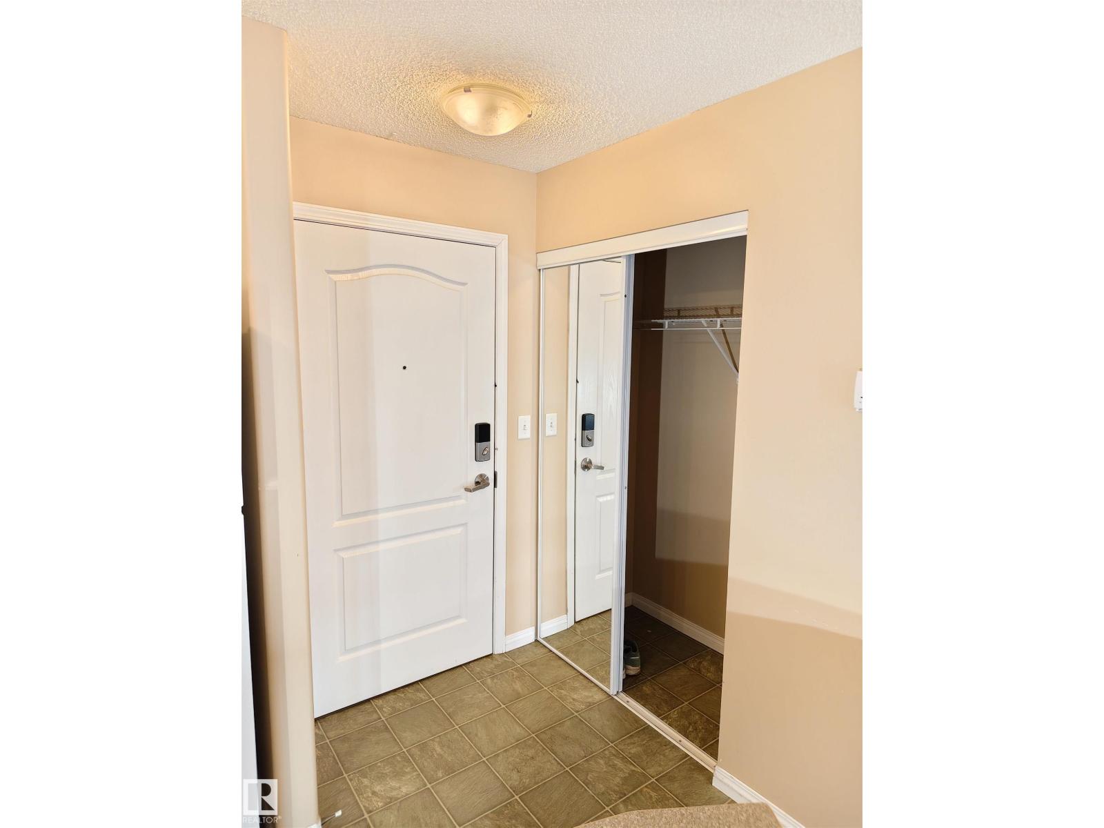 #209 7511 171 ST NW NW - 26