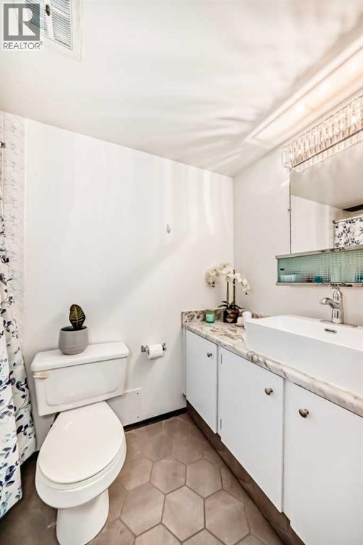 #305 635 57 Avenue SW - 22