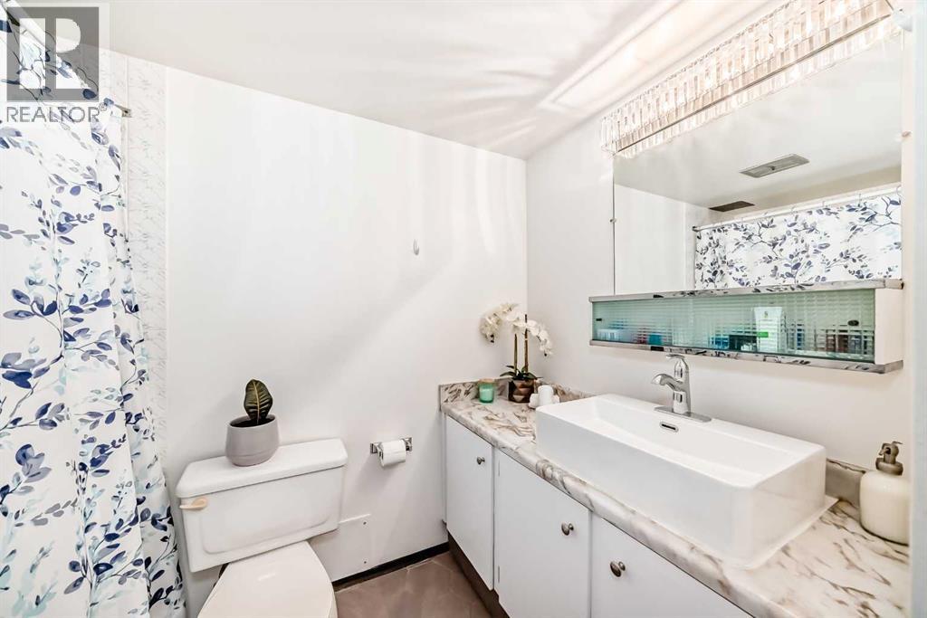#305 635 57 Avenue SW - 21