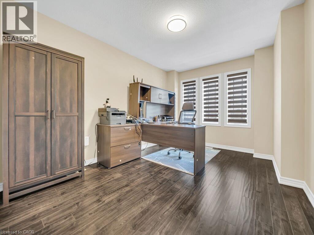 Office space featuring dark wood finished floors