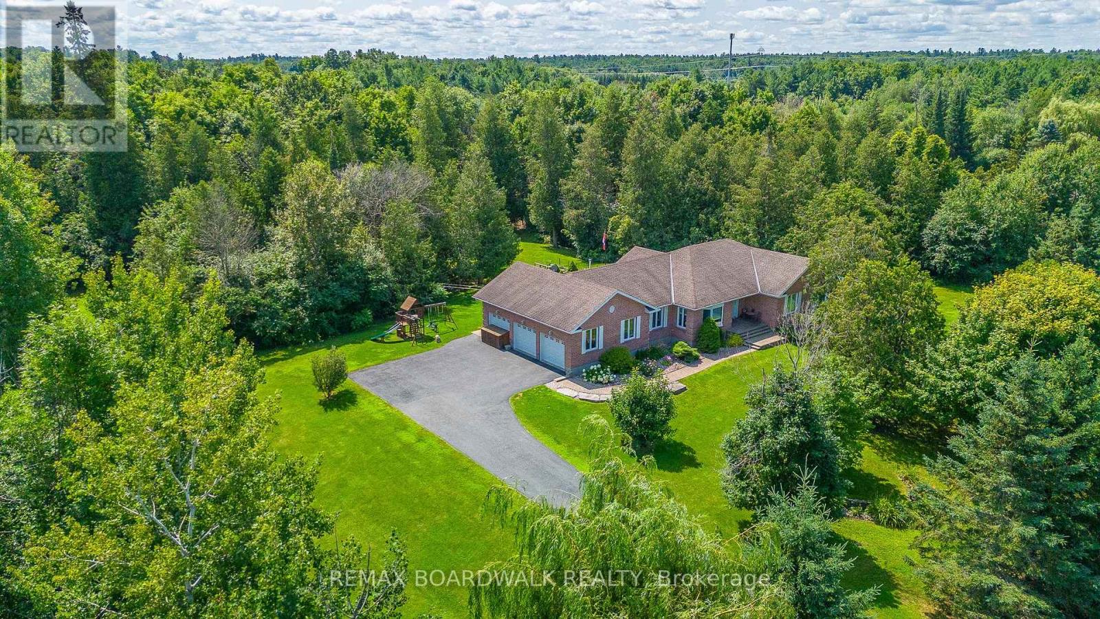 Rarely Offered Bungalow w/3 Car Heated Garage