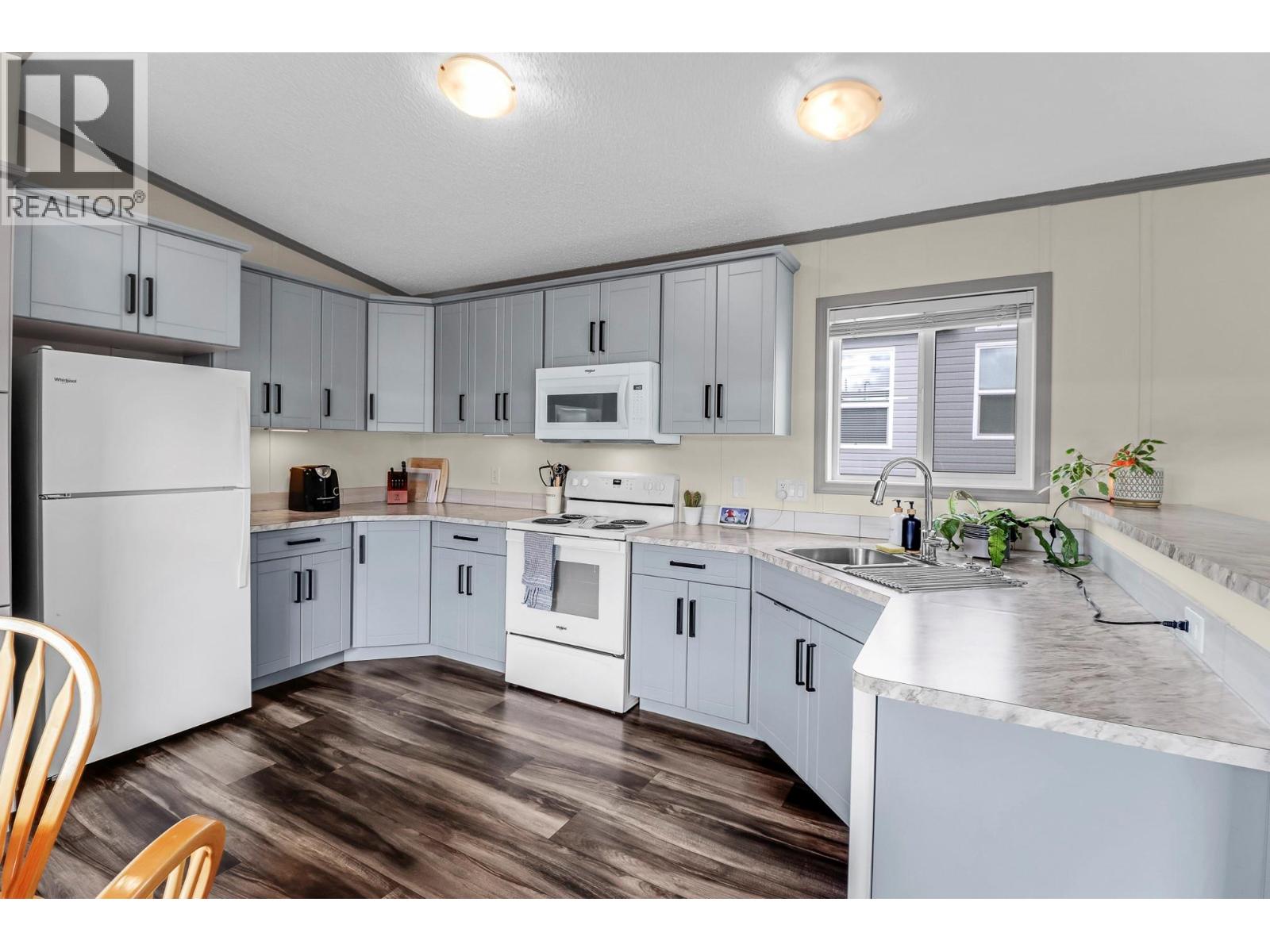 1008 STEEPLEVIEW Drive NW, Cranbrook