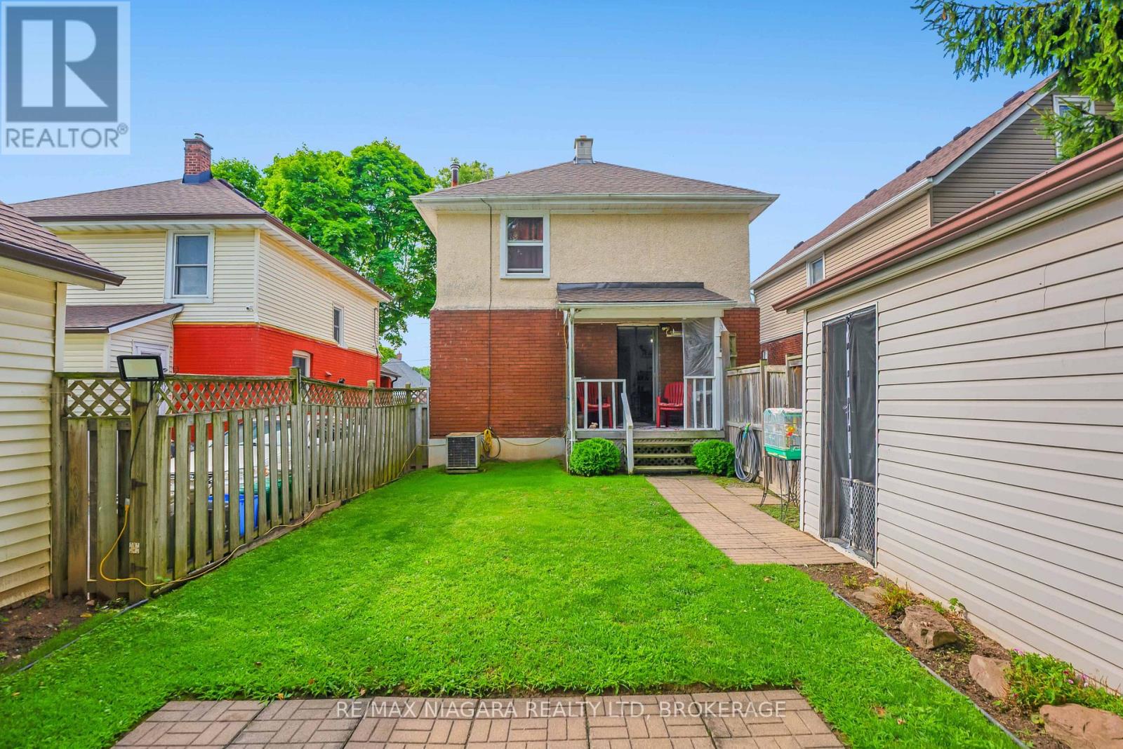 Backyard with entrance to main floor