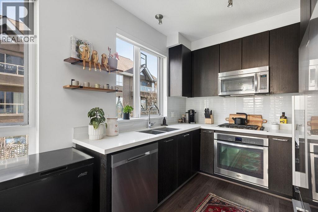 207 217 W 8TH STREET — photo 8