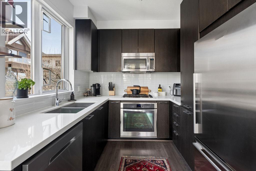 207 217 W 8TH STREET — photo 9