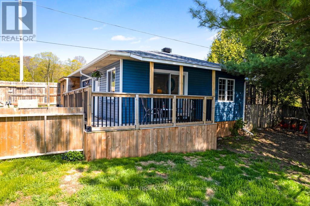 Bunkie's patio doors to 2022 covered deck