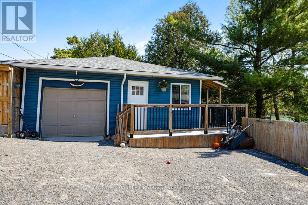 Solid wall separates garage from guest bunkie