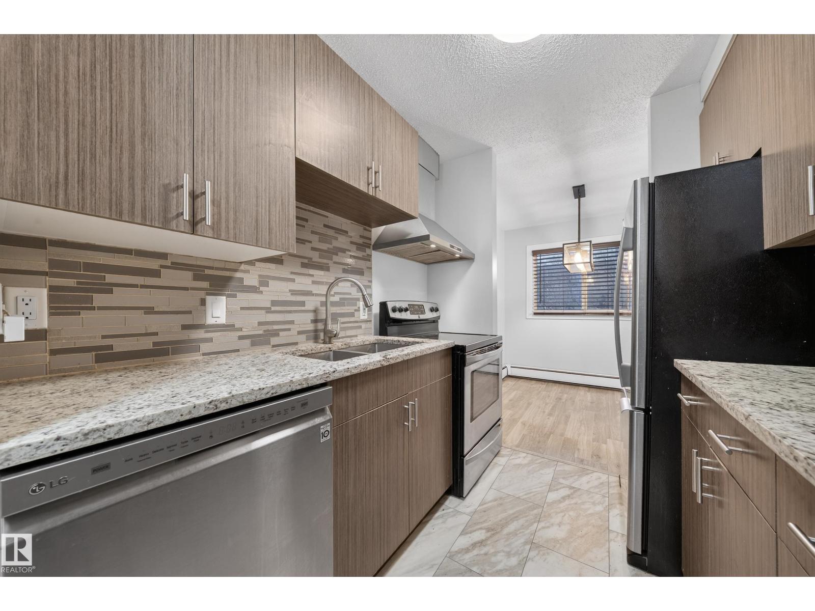 #202 10615 156 ST NW - 8