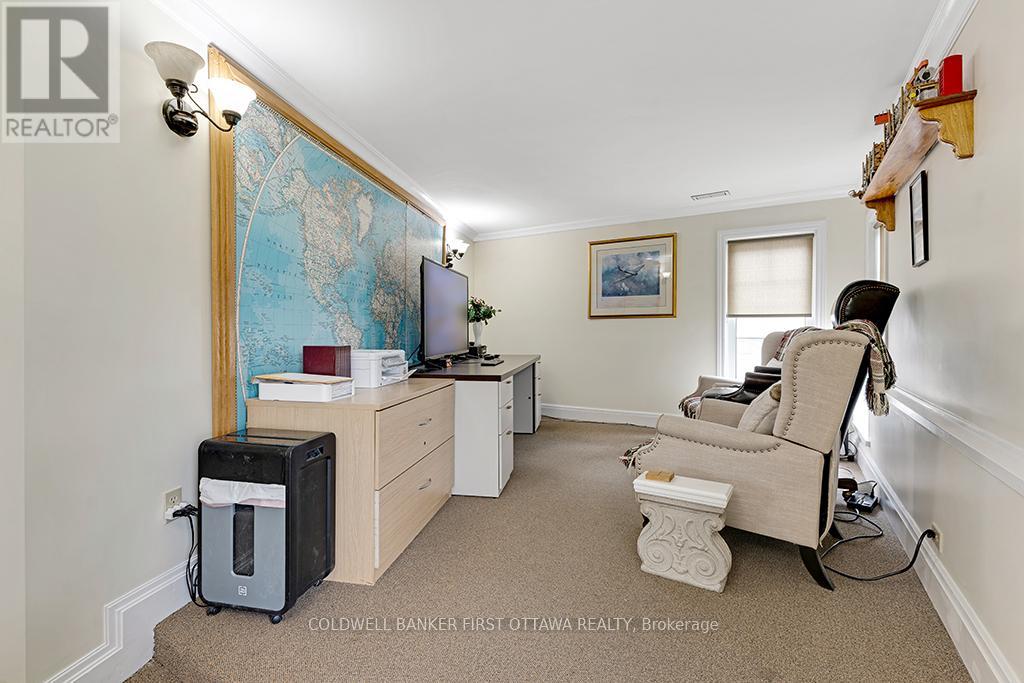 Main floor bedroom currently used as office