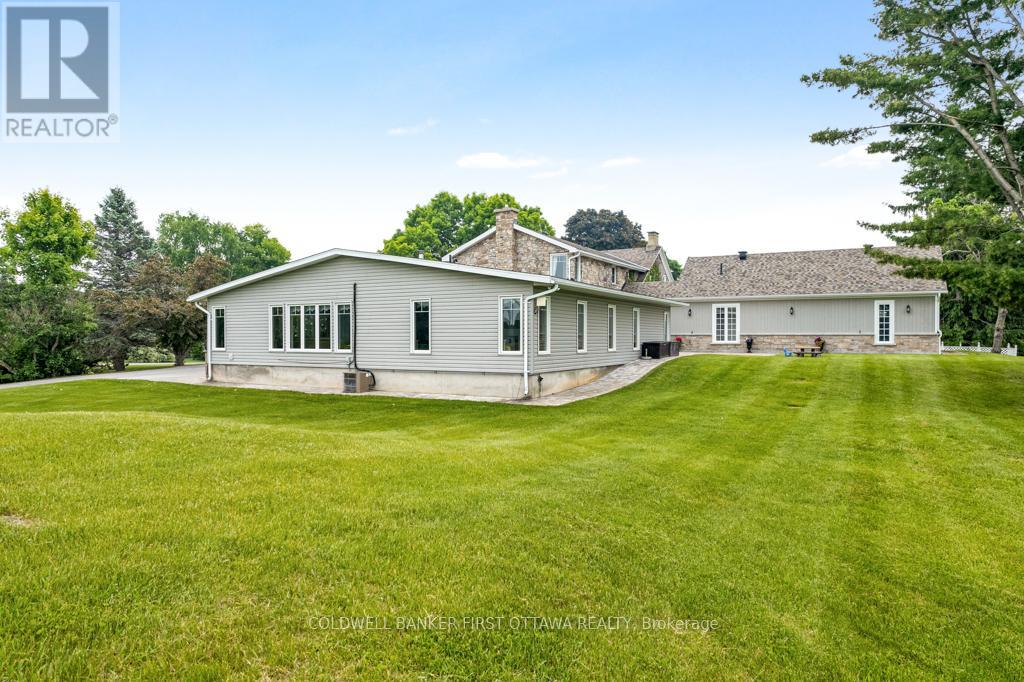 Well-designed additions & manicured lawns