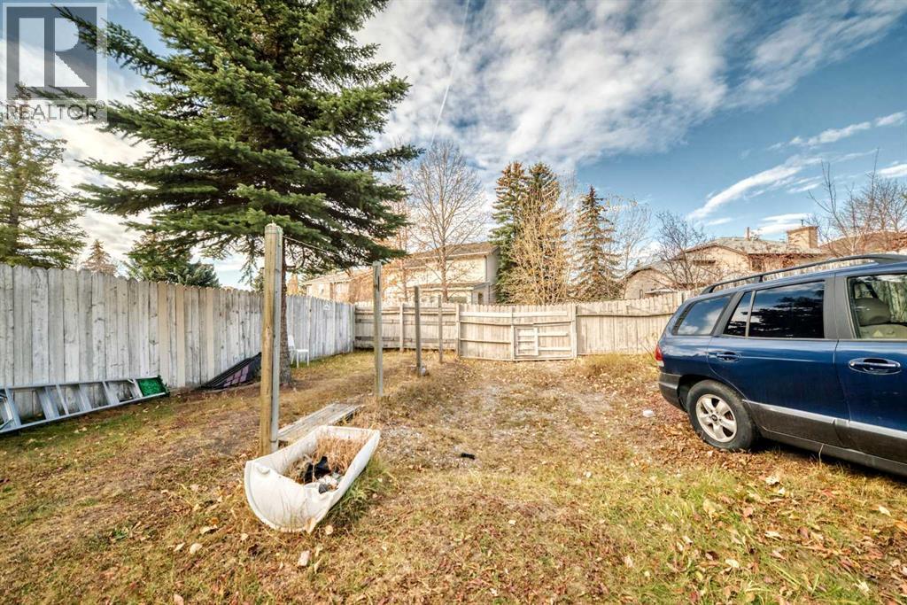 Single Family House 4 Level for Sale in  Hawkwood Boulevard NW Hawkwood Calgary 