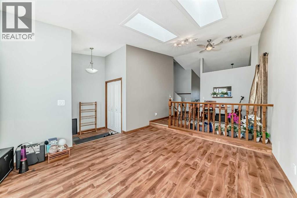 Single Family House 4 Level for Sale in  Hawkwood Boulevard NW Hawkwood Calgary 