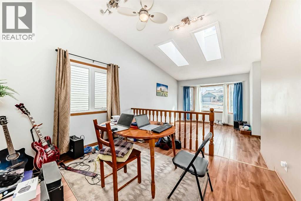 Single Family House 4 Level for Sale in  Hawkwood Boulevard NW Hawkwood Calgary 