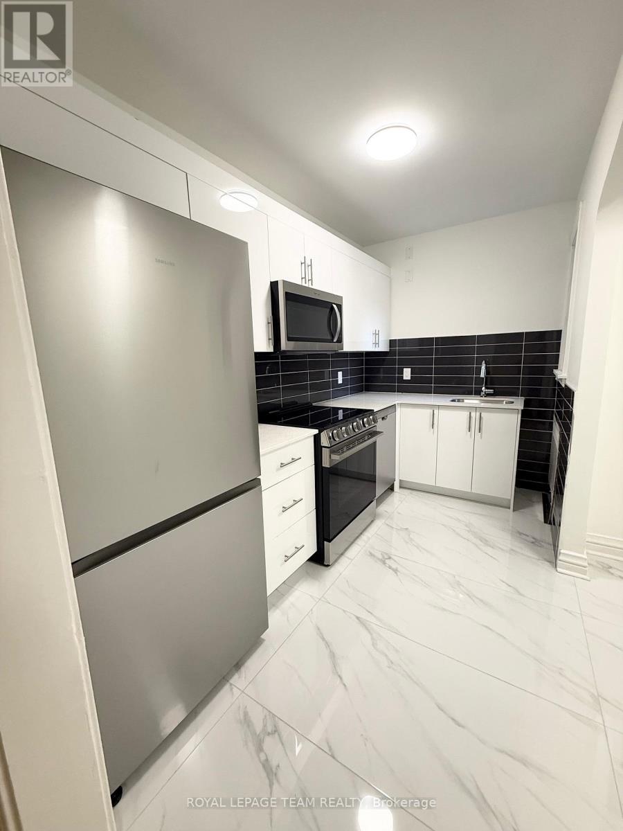 2 Bed, 1 Bath House for Rent in Ottawa – 2 – 235 COOPER STREET, Ottawa – MLS# X12972886 - Image 13