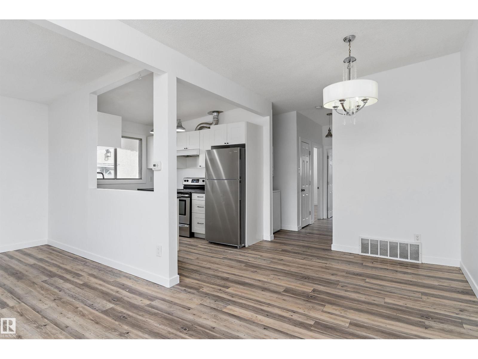 6103-6105 97A AV NW - 5