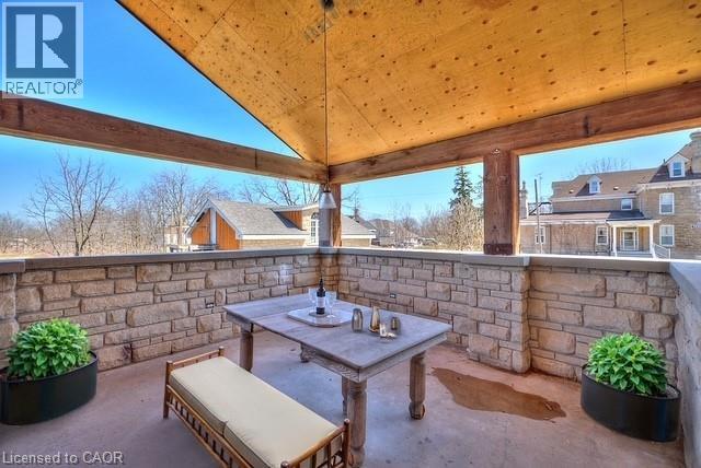 View of patio with outdoor dining space