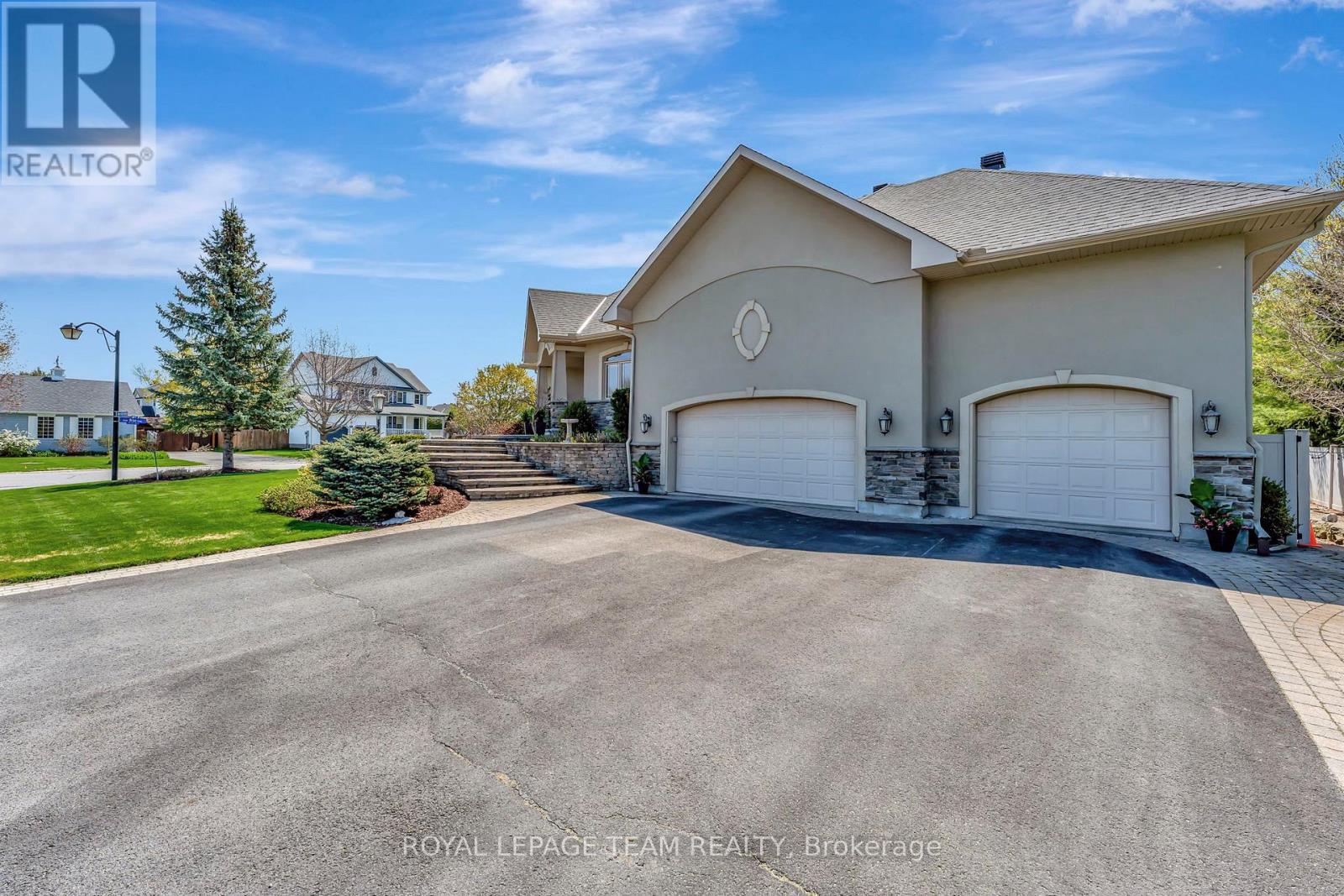 3 car garage with entry to both levels