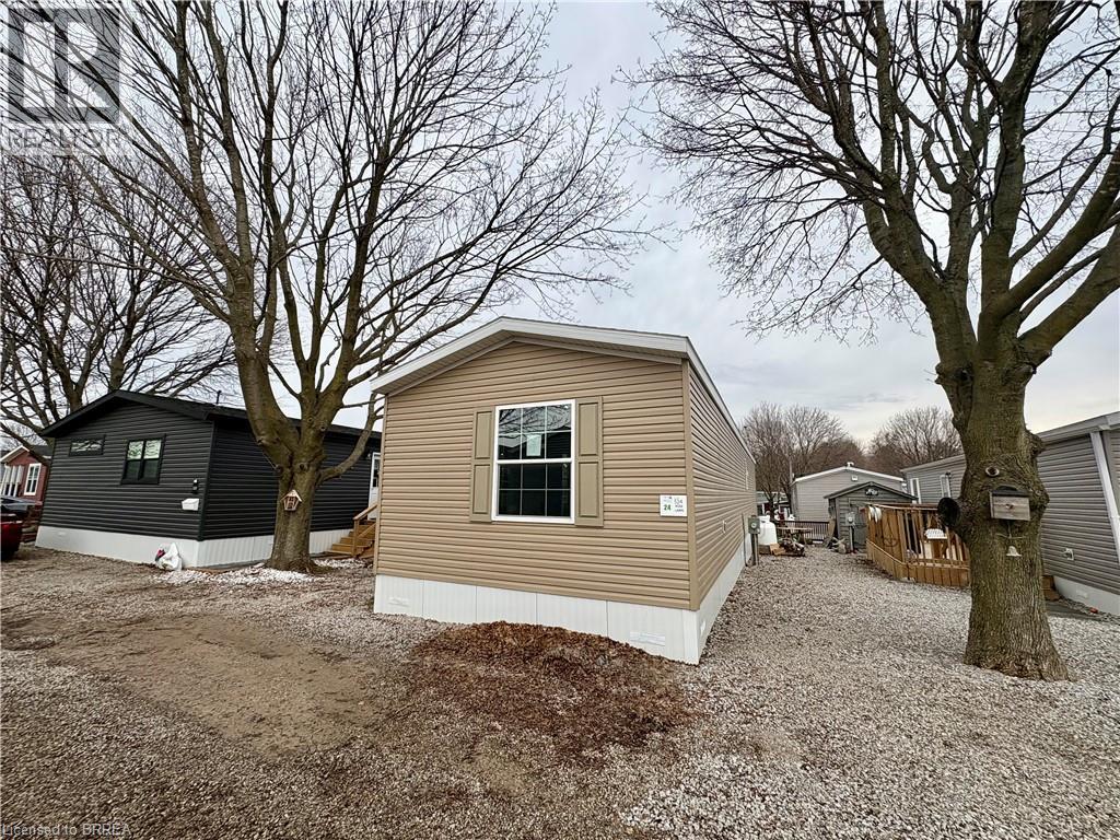 View of home's exterior featuring a wooden deck