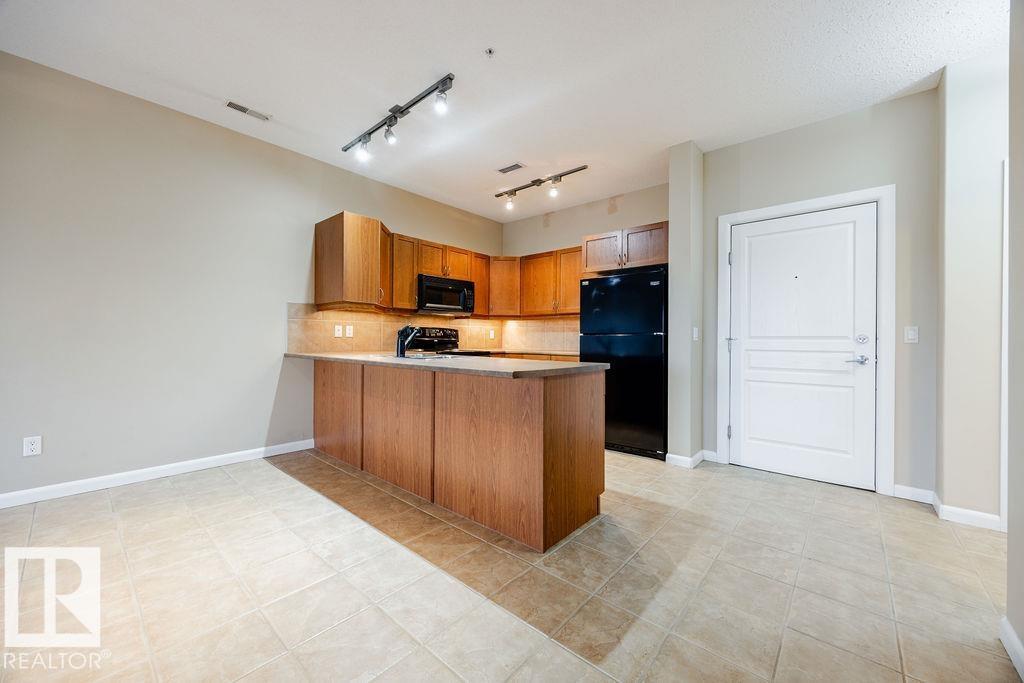 #217 160 MAGRATH RD NW - 4