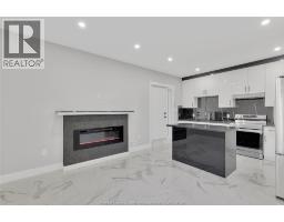 Family room/Fireplace - 1320 Grand Marais Road East, Windsor, ON N8W1W2 Photo 25
