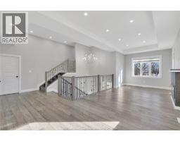 Living room/Fireplace - 1320 Grand Marais Road East, Windsor, ON N8W1W2 Photo 7