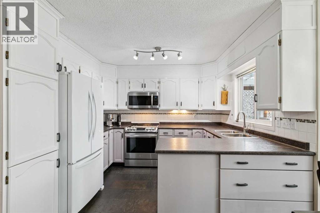 Single Family House for Sale in  Erin Meadow Close SE Erin Woods Calgary 