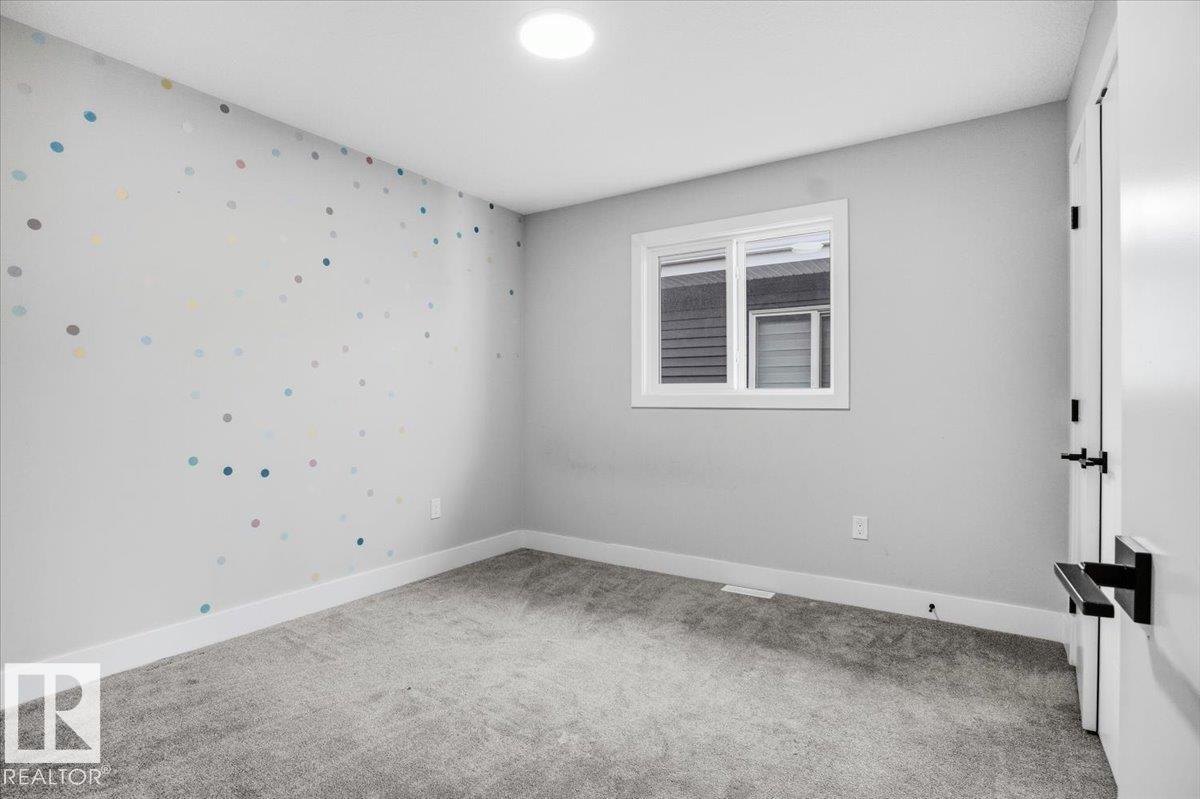 6911 173 AV NW NW - 33