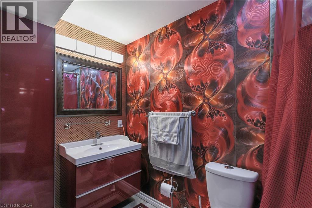 Full bathroom with vanity and toilet