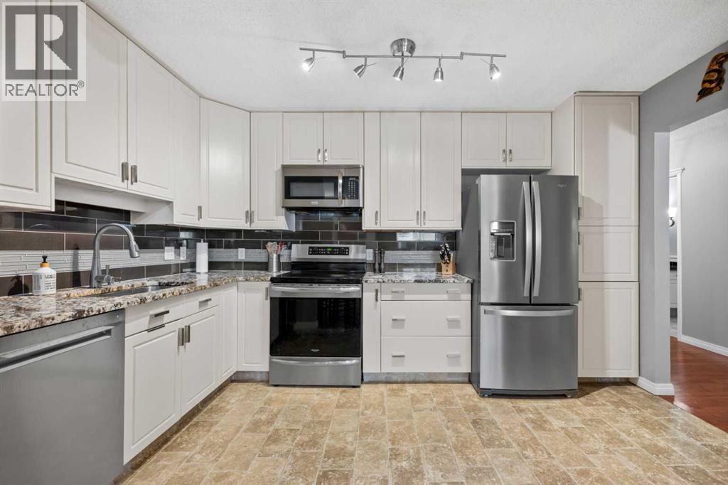 Single Family House Bungalow for Sale in  Richelieu Court SW Lincoln Park Calgary 